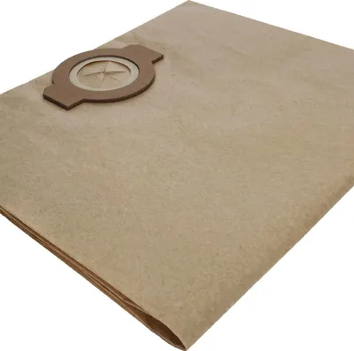 A close-up, angled view of a brown paper vacuum cleaner bag with a cardboard attachment.