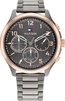 A close-up studio shot of a Tommy Hilfiger men's watch.