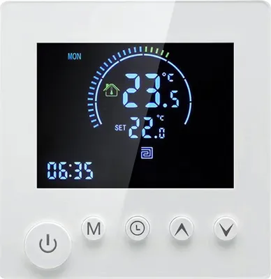 A white digital thermostat with a black LCD screen displaying temperature and time.