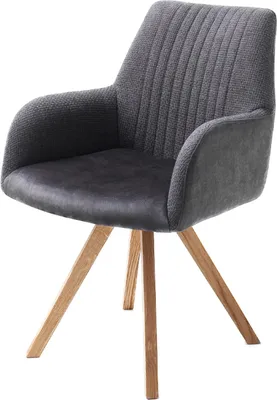 A single armchair with wooden legs against a white background.