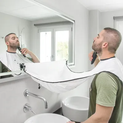 Immagine prodotto di innovagoods, bavaglino raccogli-barba con ventose, 1 pezzo