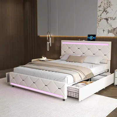 A modern bedroom with a beige upholstered bed featuring LED lighting and USB charging ports.