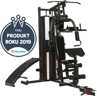 A black multi-gym fitness machine is shown against a white background. A circular badge with text and a crown graphic is overlaid on the left side of the image.