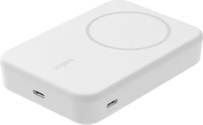 A white Belkin BoostCharge Pro power bank with a magnetic charging circle on top and two USB-C ports on the side.