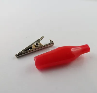 Immagine prodotto di 1 x Morsetto a coccodrillo, morsetto a coccodrillo, 60 VDC, a bocca, morsetti, rosso, per saldatura, crimpabile / Tipo = coccodrillo, rosso