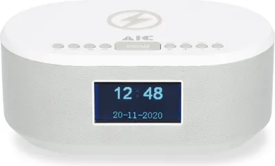 A white and gray digital alarm clock with a blue display screen.