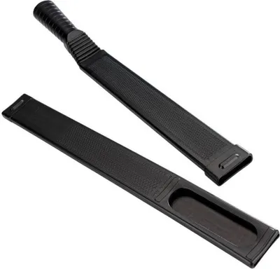 Two black, flat objects, possibly parts of a larger device, against a white background.