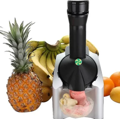 A dessert maker with fruit in the background.