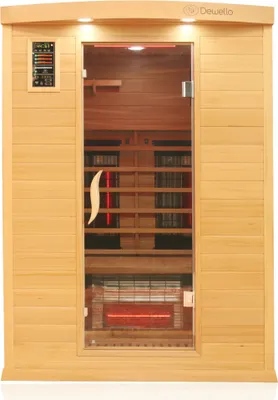 A front view of a wooden infrared sauna cabin with a glass door.