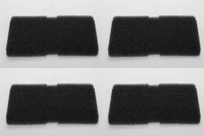 Four black foam filters are arranged in a two-by-two grid on a white background.