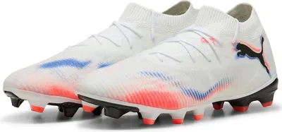 A pair of white Puma soccer cleats with pink and blue accents.