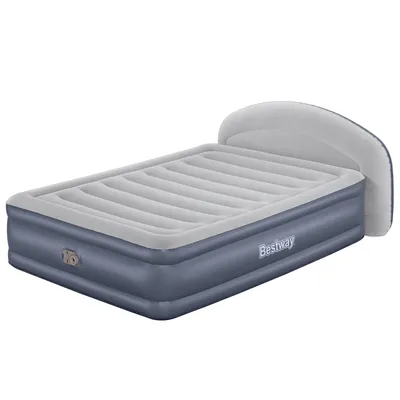 An inflatable air mattress with a headboard.