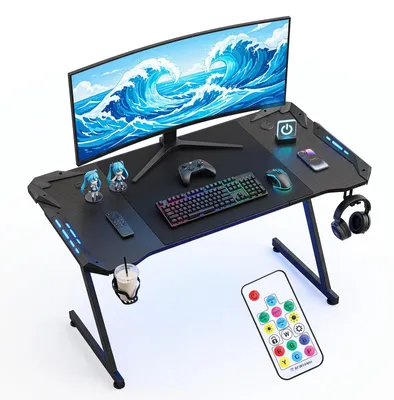 Image de Table de jeu Peviasot, dimensions 120x60 cm, forme en Z, avec éclairage RGB LED, porte-boissons et support pour casque