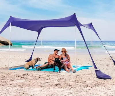 Produktbild von SUN NINJA Strandzelt mit UPF50+ - Sonnenschutz Strand Sonnensegel mit Sandschaufel & Erdnägeln - Strandmuschel Baby UV Schutz 50 - Beach Tent