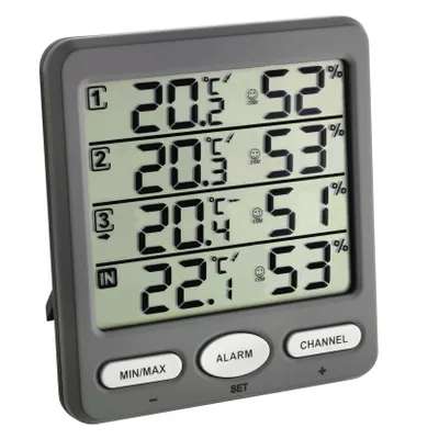 A digital thermometer and hygrometer displaying indoor and outdoor temperature and humidity readings.