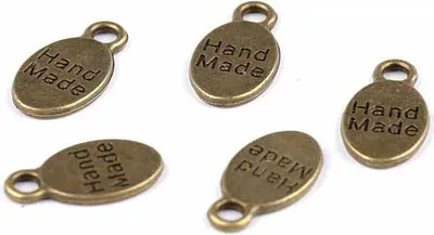 Immagine prodotto di Ciondolo in ottone fatto a mano 8x15mm - 5 pezzi