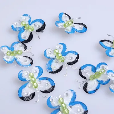 Produktbild von Streudeko Organzaschmetterlinge weiß-blau-grün 3,5 cm 12 Stück