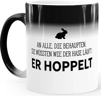 Produktbild von Zaubertasse Farbwechsel Tasse lustiger Spruch an alle die behaupten sie wüssten wie der Hase läuft-er hoppelt MoonWorks® weiß Magic-Tasse