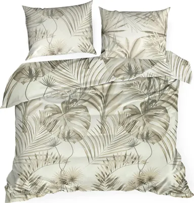 A bedding set with a tropical leaf pattern.