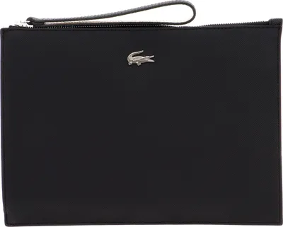A black clutch bag with a silver crocodile logo.