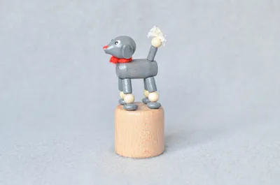 Produktbild von Holzspielzeug Wackelfigur Pudel grau Höhe=7,5cm NEU
