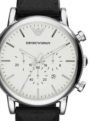 A close-up, front-facing view of an Emporio Armani watch with a white dial and a black leather strap.
