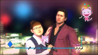 Two people are singing karaoke in front of a city skyline at night.