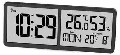 A digital clock displaying time, temperature, humidity, and date.