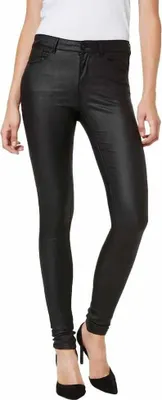 A person wearing black skinny jeans and black high heels, shown from the waist down against a white background.