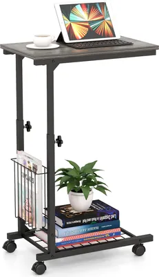 A mobile laptop desk with books and a plant on a white background.