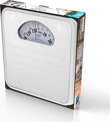 A white mechanical scale is shown on its packaging.