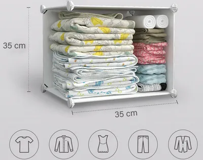 A modular wardrobe organizer filled with folded clothes and rolled items, with dimensions indicated.