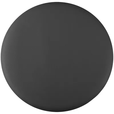 A plain black circular cushion on a white background.