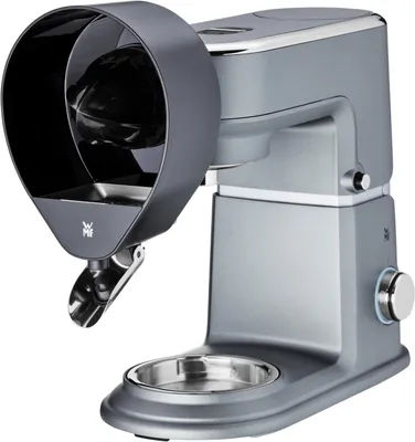 Imagen del producto de Exprimidor de cítricos WMF Profi Plus, modelo 3200000135, código de barras 4211129131124