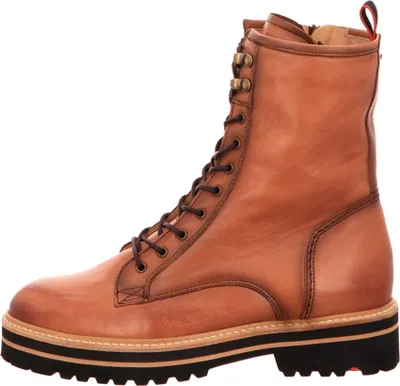 A single brown leather boot is shown against a white background.
