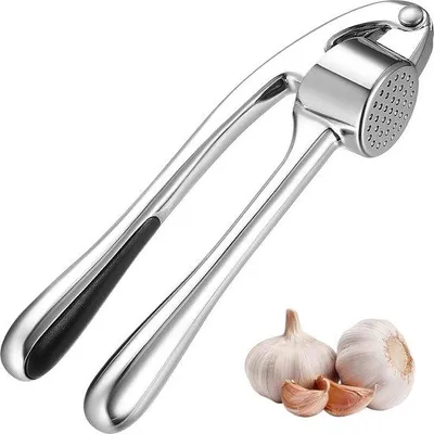 Image de Presse-ail en zinc - Coupe-ail pour pâtes