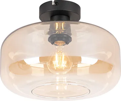 A close-up studio shot of a black and amber glass ceiling light fixture.
