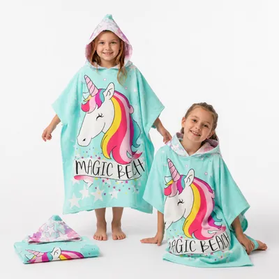 Immagine prodotto di Poncho mare con cappuccio per bambini - Unicorno, 120 cm, productTiles.product.images.aiGenerated