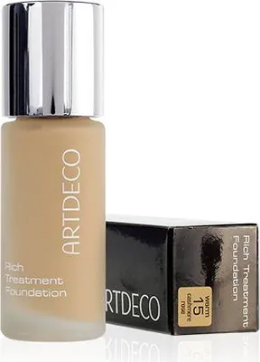 A bottle of Artdeco Rich Treatment Foundation and its packaging are displayed against a white background.