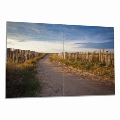 Produktbild von Wallario Herdabdeckplatte aus Glas, Größe 80 x 52 cm 2-teilig, Motiv Sandweg an einem Strand in Frankreich, Bretagne