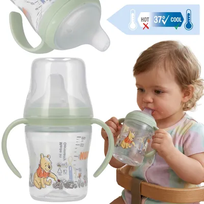 Produktbild von NUK DISNEY Winnie Puuh Trinklernflasche mit Griffen, Anti-Kolik, mit tropffreiem Sauger, 150 ml, ab 6 Monaten