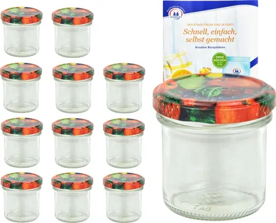 A set of small glass jars with decorative lids and a recipe booklet.