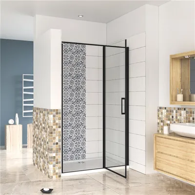 A modern bathroom with a shower enclosure, vanity, and sink.