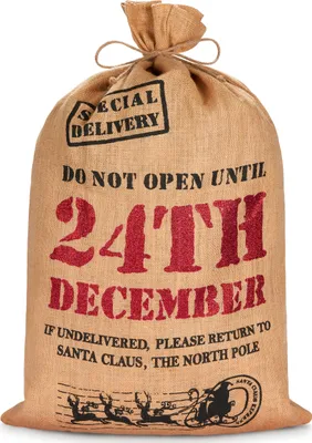 A burlap sack with Christmas-themed text and graphics.