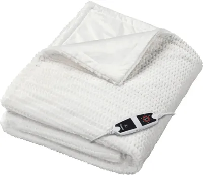 A folded white electric blanket with a controller attached.