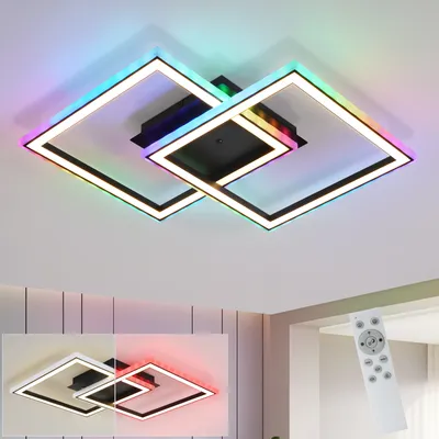 A modern, multi-tiered square LED ceiling light with integrated RGB color-changing capabilities, shown illuminated with various colors against a white ceiling. A smaller inset image shows the light with white and red illumination, and a remote control is v