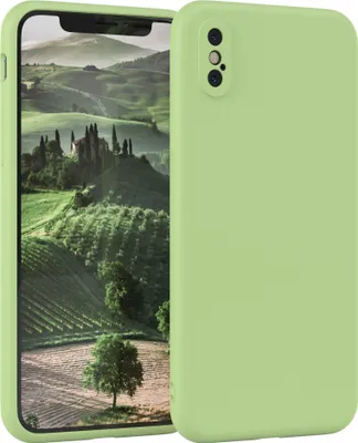 A light green phone case is shown next to a smartphone displaying a landscape image.
