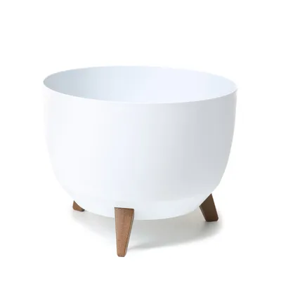 A white planter pot with three wooden legs is shown against a white background.