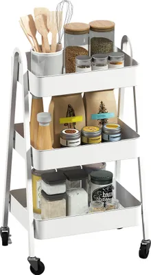 A white three-tier rolling cart filled with various kitchen items.