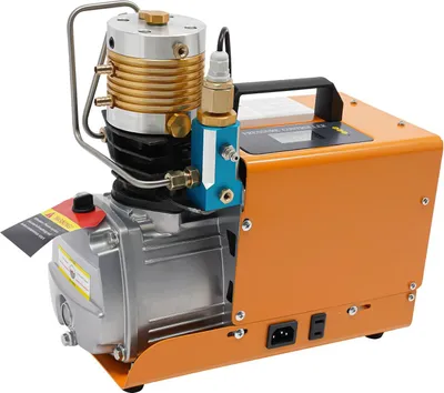 A product shot of an orange and silver air compressor.